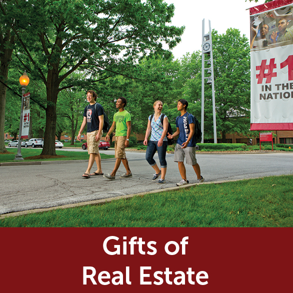 Rollover image of students walking on campus. Link to Gifts of Real Estate.