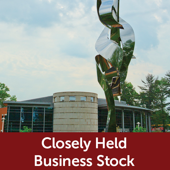 Rollover image of Hatfield Hall and The Flame of the Millenium. Link to Closely Held Business Stock.